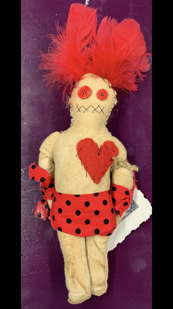 Voodoo doll figure.With 8 Swarovski crystals embedded.Keep away bad omens.3  inch